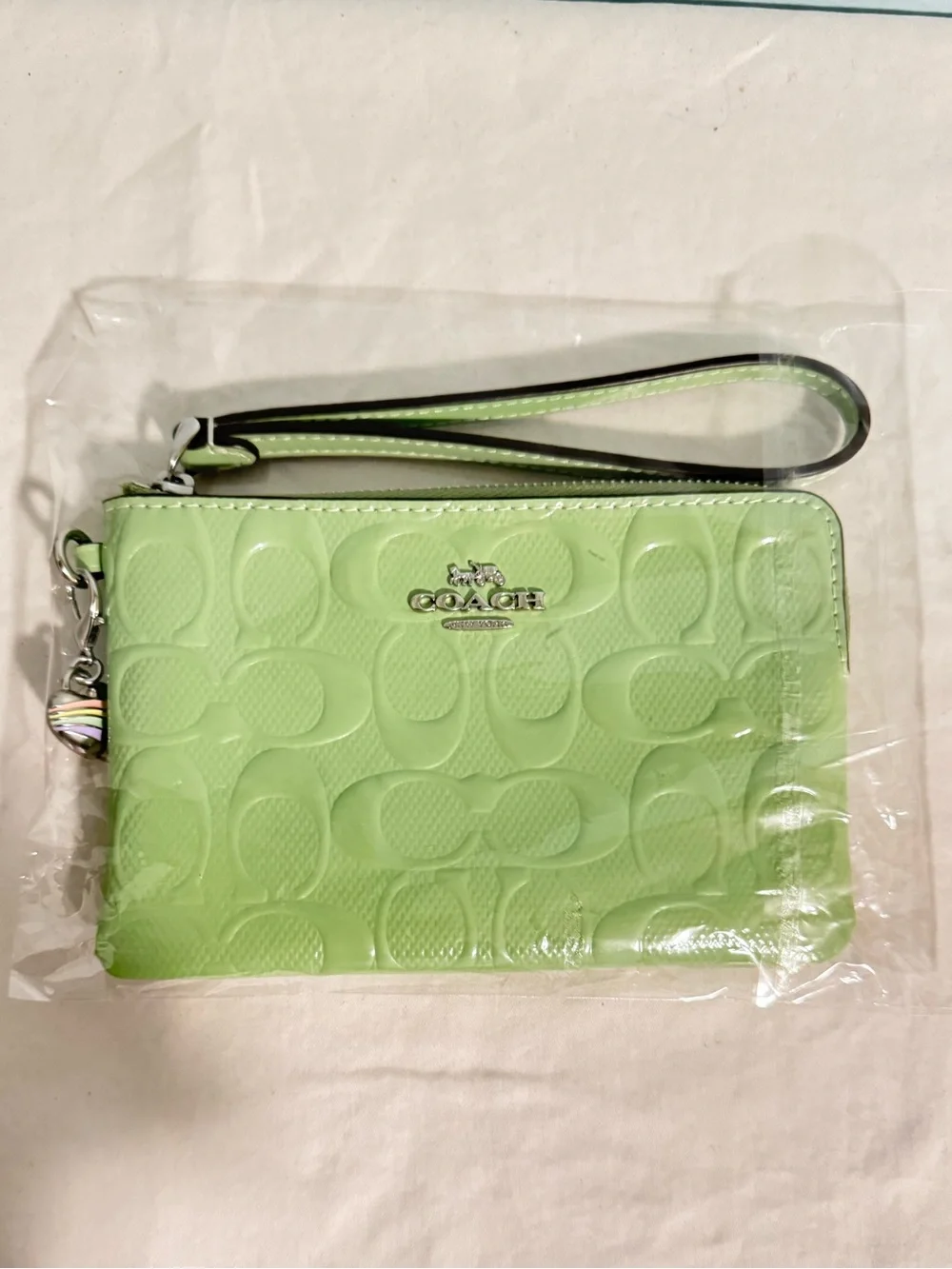 Coach Light Green Patent Signature Wristlet with Rainbow Charm 🌈! NWT
